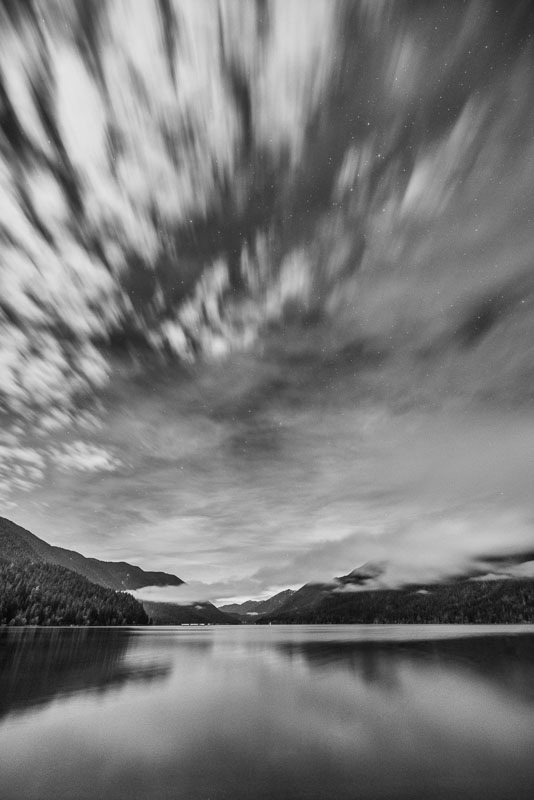 Clouds and stars adorn the sky