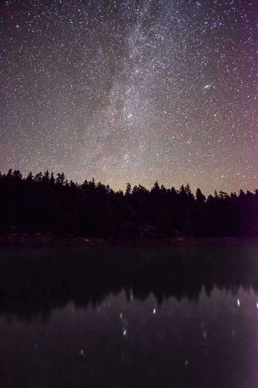 Northern Milky Way with the saucer-shaped Andromeda Galaxy to the right,