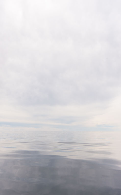 Vastness over calm waters