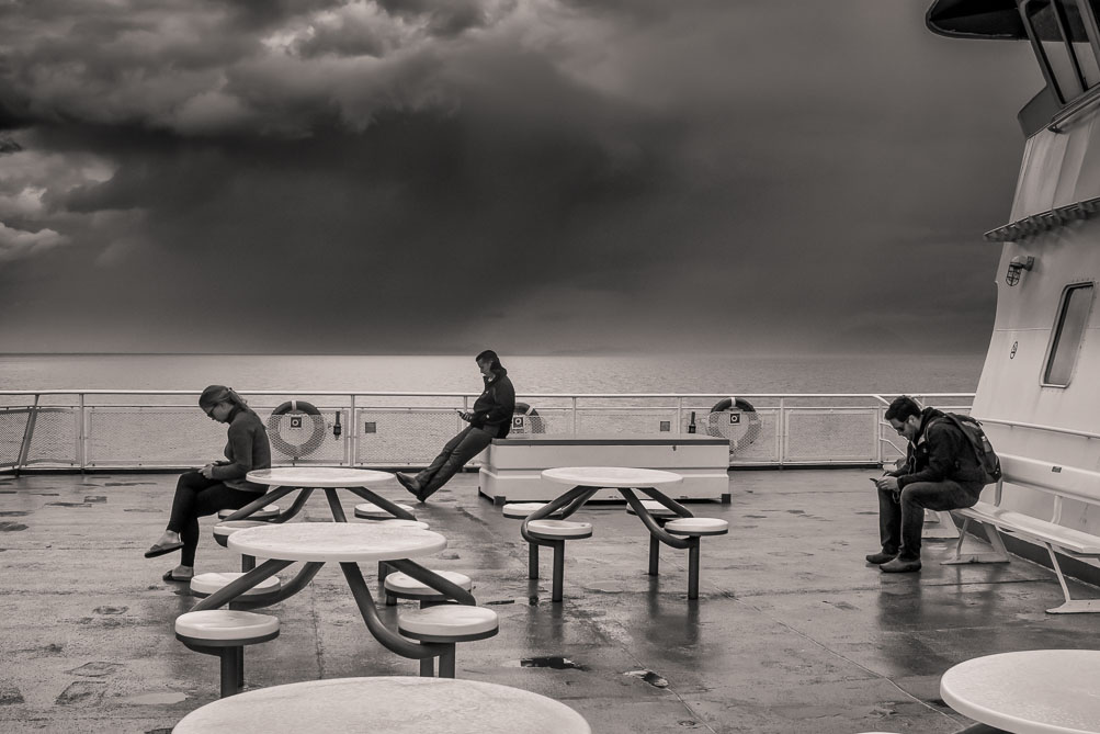 People immersed in their phones